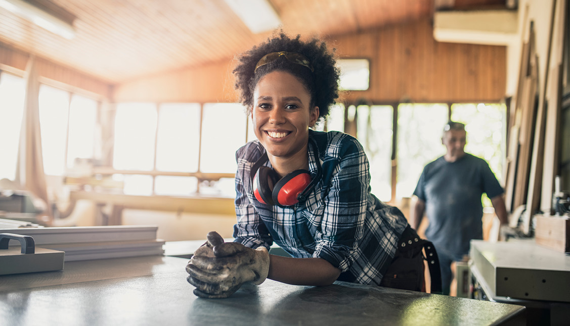 Woman learning a skilled trade